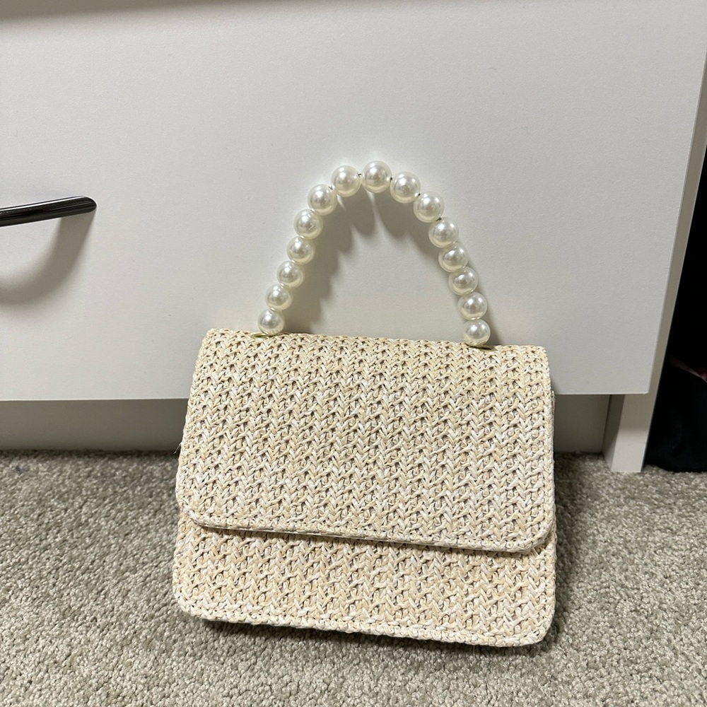 Elegant Cream Woven Handbag with Pearl Handle
